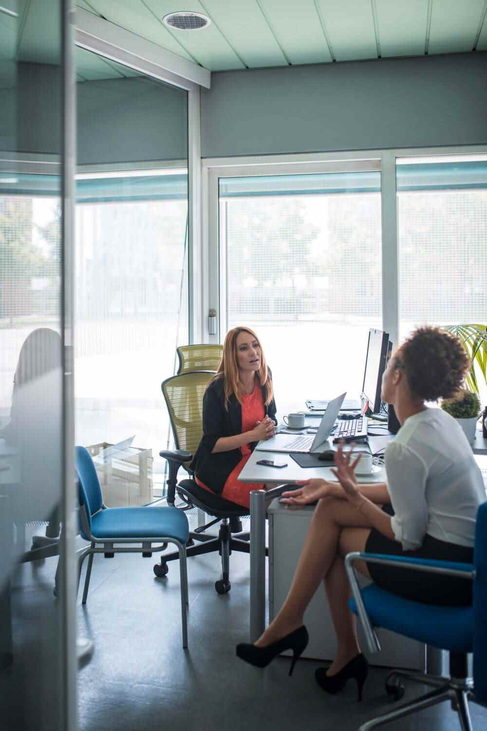 women-talking-during-job-interview