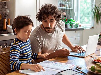 Father helping son with homework