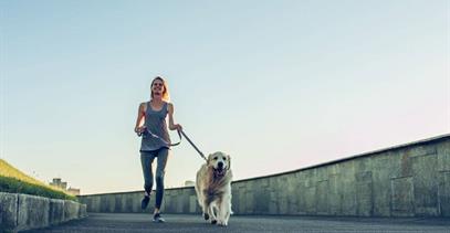 woman-running-with-dog