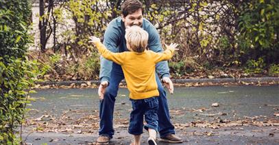 son hugging dad